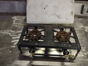 lot 17 image: Two Burner Cast Iron LP Gas Stove, ...