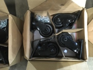 lot 28 image: Lot of 3 Husky 4 in. Caster Kit for Heavy Duty Welded Steel Garage Base Cabinets See Pictures