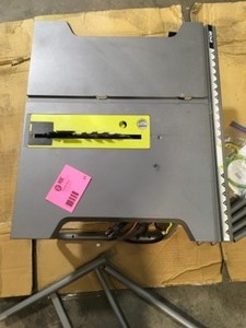 lot 31 image: RYOBI 15 Amp 10 in. Table Saw with Folding Stand Open Box Customer Returns See Pictures