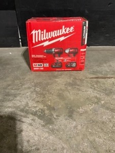 lot 18 image: Milwaukee M18 18-Volt Lithium-Ion Cordless Drill DriverImpact Driver Combo Kit w Two 1.5Ah Batteries, Charger Tool Bag (2-Tool). See Pictures