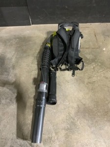 lot 24 image: RYOBI 175 MPH 760 CFM 38cc Gas Backpack Leaf Blower. See Pictures