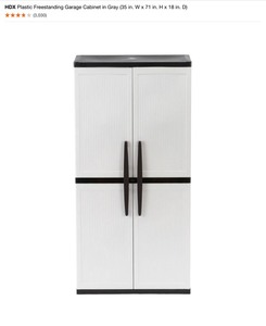 lot 26 image: HDX Plastic Freestanding Garage Cabinet in Gray (35 in. W x 71 in. H x 18 in. D). See Pictures