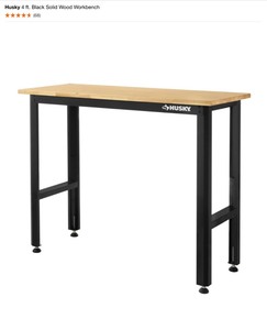 lot 36 image: Husky 4 ft. Black Solid Wood Workbench. See Pictures