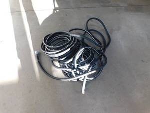 lot 99 image: Neverkink Max Teknor Apex 58-in x 100-ft Contractor Kink Free Vinyl Black Coiled Hose