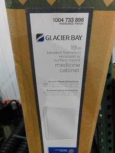 lot 124 image: Glacier Bay 19-58 in. x 26 in. Recessed or Surface Mount Beveled Frameless Medicine Cabinet with Mirror