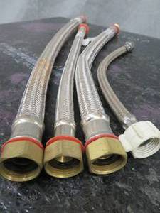 lot 9 image: STAINLESS STEEL WATER HEATER CONNECTORS