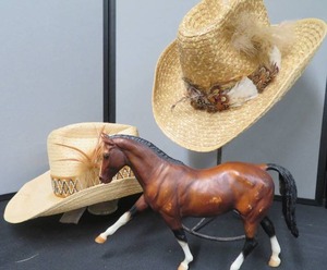 lot 28 image: BREYER HORSE AND 2 NEW STRAW COWBOY HATS.