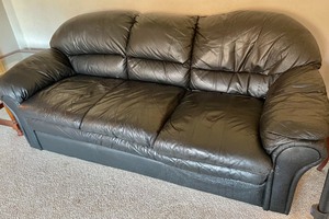 lot 133 image: Black Leather Couch