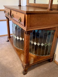 lot 2 image: Antique Tigers Eye Oak  Buffet w Curved Leaded Glass