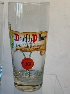 lot 8 image: Four Pilsner Glasses from East German Breweries