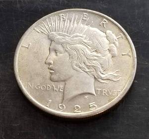 1925 PEACE SILVER DOLLAR