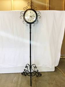 OUI OUI PARIS&nbsp THIS ROMANTIC FRENCH CAFE STYLE LOVELY&nbspTALL SCROLLED IRON CLOCK IS IN EXCELLENT WORKING CONDITION THREE LEGGED STAND IS COLLAPSIBLE - NEEDS NEW BATTERIES