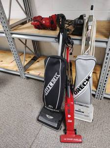lot 105 image: Five Vacuums