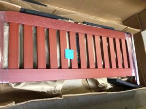 Weatherly 60 in. Rustic Red Plastic Porch Swing by Highwood Customer Returns See Pictures