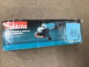 Makita 7.5 Amp 4-12 in. Paddle Switch Angle Grinder  USED Customer Returns See Pictures