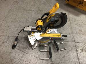 15 Amp Corded 12 in. Double Bevel Sliding Compound Miter Saw with XPS technology, Blade Wrench & Material Clamp by DEWALT Customer Returns See Pictures