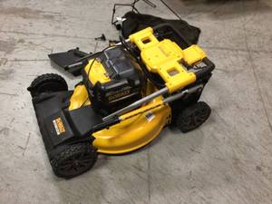 21.5 in. 20-Volt MAX Lithium-Ion Cordless Battery Walk Behind Self Propelled Mower by DEWALT tool only no batteries included Customer Returns See Pictures