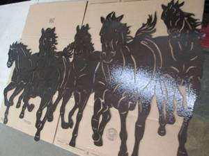 5 horse metal cut out . brown looks...