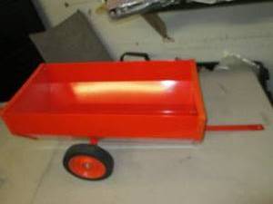 small orange wagon looks new 33 inc...