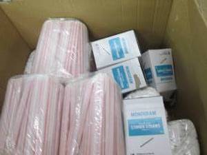 box of plastic straws and stir stic...