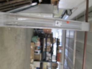 12 foot x 12 foot metal shelf has a...