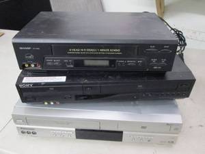3 vhs players power on...