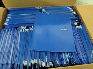 box full of blue folders...