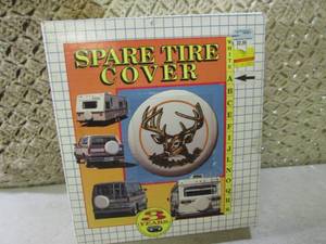 lot 23 image: (F-3) Spare Tire Cover White...