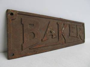 lot 41 image: Antique BAKER Cast Iron Sign