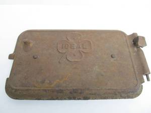 lot 48 image: Antique IDEAL Cast Iron Door