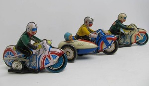 lot 128 image: Vintage Tin Litho Motorcycle Toys