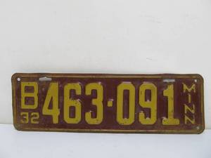 lot 142 image: Vintage 1932 Maroon & Gold Matching License Plate Set