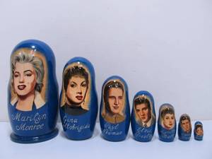 lot 204 image: Hollywood & Music Stars Wooden Russian Matryoshka Nesting Dolls inc. Marilyn Monroe