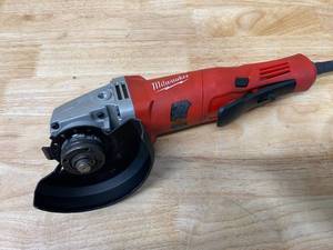 lot 8 image: MILWAUKEE 11 Amp Corded 4-12 in. Small Angle Grinder with Lock-On Paddle Switch