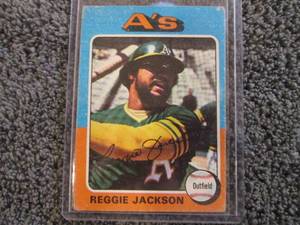 lot 1 image: 1975 Topps Reggie Jackson Card...