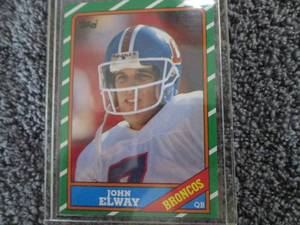 lot 6 image: 1986 Topps John Elway Card...