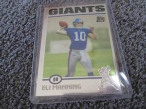 lot 94 image: 2004 Topps Chrome Eli Manning Rooki...