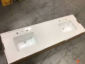 lot 108 image: 73 in. W Composite Stone Double Basin Vanity Top in Milano White with White Basins by Altair Customer Returns See Pictures