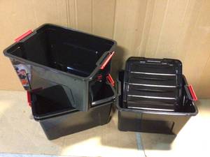 lot 70 image: IRIS USA 38 Qt. Stack and Pull Nesting Storage Tote, with Red Latching Clips, in Black, Customer Returns See Pictures