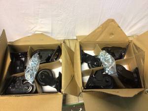 lot 97 image: Husky 4 in. Caster Kit for Heavy Duty Welded Steel Garage Base Cabinets &nbspCustomer Returns See Pictures
