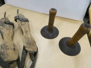 Vintage ice skates and coat hangers
