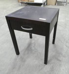 Nice wood side table, just needs some cleaning on the top and a screw to hold the handle on the one side. This is actually very dark cherry color with a black top