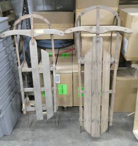 Two vintage snow sleds