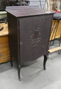 Very nice vintage music cabinet very dark, 4 inside shelves, lockable but don�t have the key