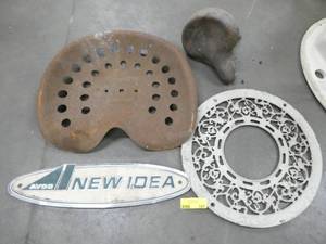 A few primitives - tractor seat, vent cover, bike seat, New Idea emblem