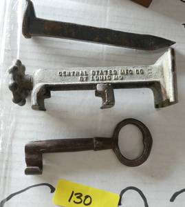 Railroad spike, Antique key and Jar opener