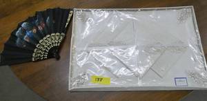 A new package of table linens and a fan from spain