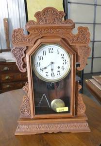Antique Waterbury gingerbread clock, 8 day spring, strikes on the half hour