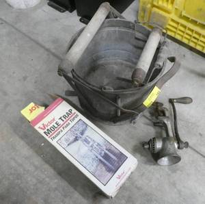 Old wash bucket, grinder and mole trap