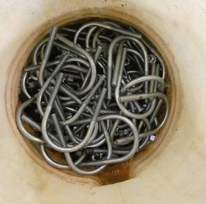 Bucket with a bunch of U bolts
